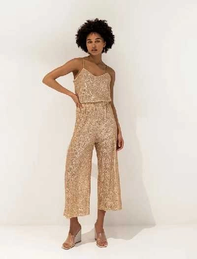 Ψηλόμεσο παντελόνι σε crop μήκος με χρυσή-σαμπανιζέ απόχρωση
