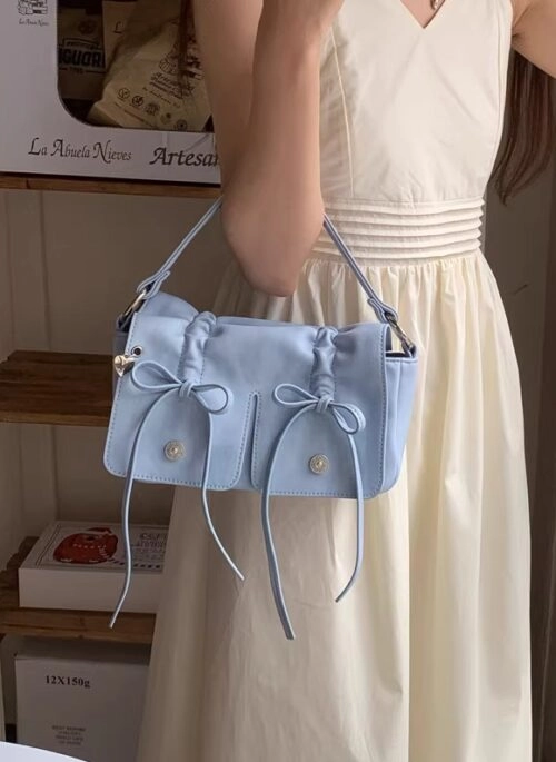 Sky Blue Mini Drawstring Bow Sling Bag | Wonhee – ILLIT